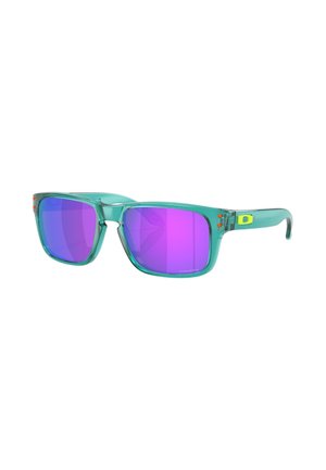 Aqua-transparente Sonnenbrille mit quadratischen Rahmen, lila Verlaufsgläsern, orangefarbenen Akzenten an den Schläfen und einem gelben Highlight in der Nähe des Scharniers.