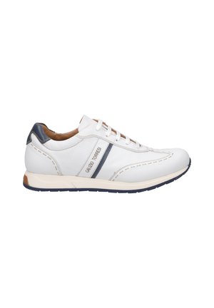 White leather sneaker with navy accents, perforated design, white laces, padded collar, and a rubber sole with blue detailing.