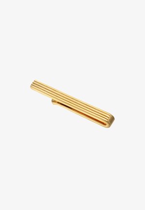 Goldfarbener Krawattenclip mit einer schlanken, länglichen Form. Verfügt über parallele Rillen entlang der Oberfläche und einen Clip-Mechanismus zur Befestigung.