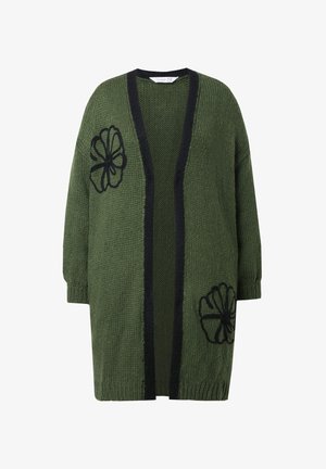 Groene gebreide cardigan met zwarte accenten. Bevat bloemenborduurwerk aan beide zijden en heeft een losse, open voorkant. Lange mouwen.