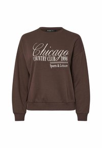 Ruskea huppari, jossa on pitkät hihat ja ribbireunat. Paitassa on valkoista tekstiä: "Chicago Country Club 1996 Sports & Leisure." Pehmeä kangas.