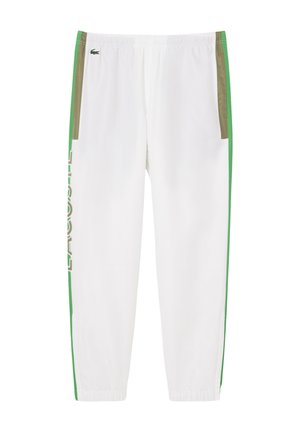 Weiße Sporthose mit grünen Seitenstreifen und khaki Akzenten an den Taschen. Mit einer Kordelzugbund und bedrucktem Logo an der Seite.