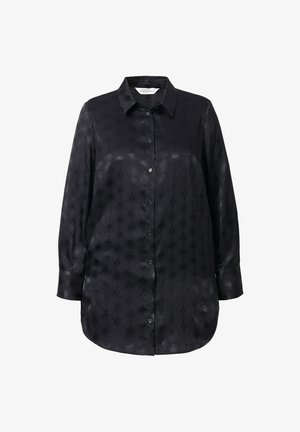 Zwarte shirt in een gladde stof met een subtiel patroon. Voorzien van een kraag, knoopsluiting aan de voorkant en lange mouwen. Klassiek pasvorm ontwerp.