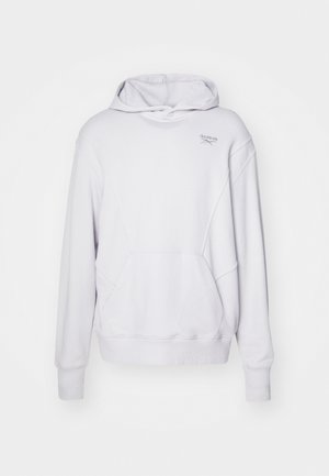 Hvid hættetrøje med lange ærmer, kængurulomme, Reebok-logo, lavet af blødt stof, med en løs pasform og ribbekanter.