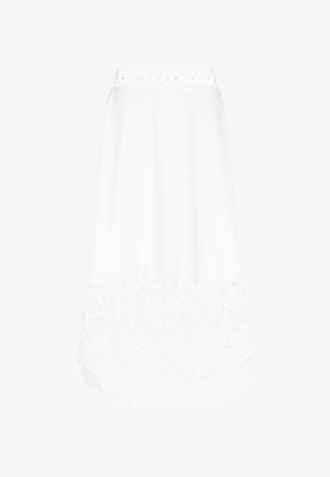 Jupe midi blanche avec une section supérieure unie et un ourlet en dentelle à motifs floraux. La taille est ornée d'une bordure décorative en dentelle.