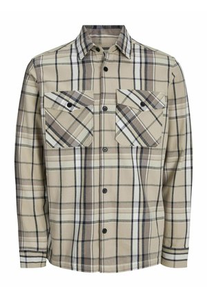 Camicia in flanella beige con motivo a quadri in marrone scuro, marrone chiaro e bianco. Presenta due tasche sul petto e bottoni neri. Maniche lunghe.