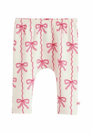 Vita leggings med rosa rosettmönster och vågiga linjer. Har resårmidja och mjukt, stretchigt tyg för komfort.