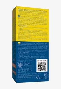 Scatola di gocce di siero booster Weleda che mostra informazioni sul prodotto, benefici d'uso in tedesco e francese, codice QR e marchi di certificazione su uno sfondo blu e giallo.