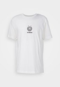 Biała bawełniana koszulka z okrągłym dekoltem, krótkimi rękawami oraz czarnym haftowanym logo Iceberg z stylizowanym królikiem w okrągłym wzorze.