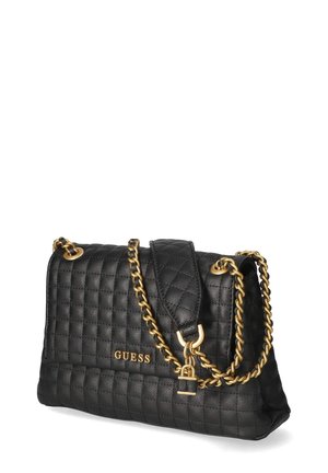 Sac à main en cuir noir matelassé avec bandoulière chaîne dorée et petit détail cadenas doré, marqué GUESS sur le devant.
