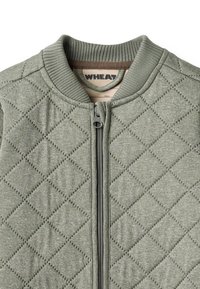 Quilted bomber jacket in light green fabric with diamond pattern. Features a ribbed collar and a zipper closure at the front.