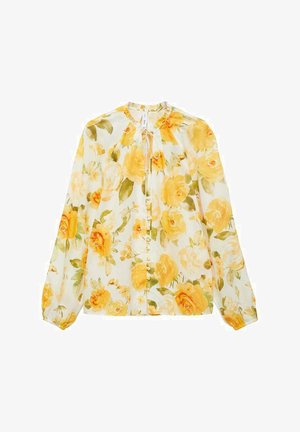 Floral blouse in light fabric with yellow and green rose patterns. Features a round neckline, long sleeves, and button closure at front.