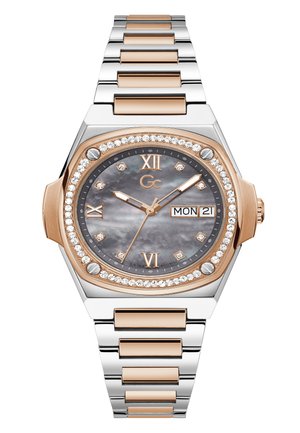 Rose gold and silver metal watch with octagonal case, gray mother-of-pearl face, diamond accents, and date display. Silver band links.