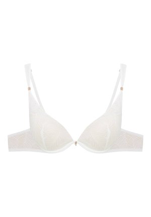 White lingerie bra with patterned lace design, triangular cups, and slender adjustable straps. Includes a central decorative hardware detail.