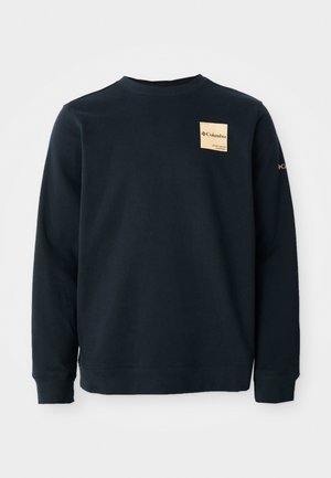 Sweat-shirt bleu marine en mélange de coton, avec un col rond, des manches longues et une étiquette de marque sur la poitrine. Texture lisse.