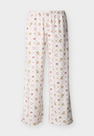 Laisvo silueto pižamos kelnės iš minkštos medžiagos; baltas pagrindas su pasikartojančiu imbierinių sausainių, širdelių ir žvaigždžių raštu smėlio ir raudonos spalvos.