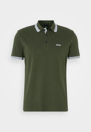 Green polo shirt made of cotton, featuring a two-button placket, black logo, and contrasting striped trim on the collar and sleeves.