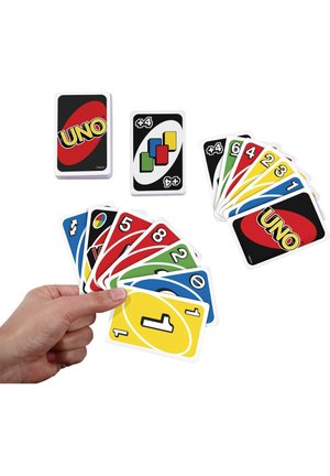 UNO card game featuring a deck with black and red cards. Colors include yellow, blue, green, and red, with numbers and symbols.