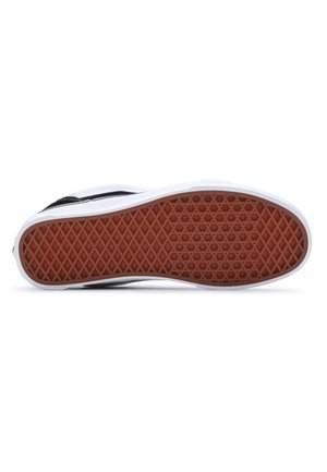Fladt billede af en sort sneakersål med et brunt vaffelmønster og hvid kant, vist mod en hvid baggrund.