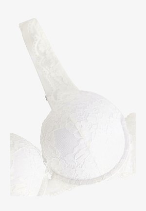 Reggiseno in pizzo bianco con motivi floreali e spalline regolabili, progettato per supporto e aspetto decorativo.