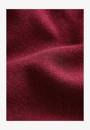 Burgundy wool fabric with a soft, textured surface featuring subtle variations in color and depth, creating a rich and warm appearance.