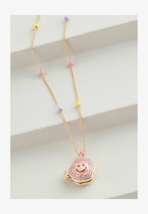 Goldene Kettenhalskette mit einem bunten blumenförmigen Anhänger, der ein lächelndes Gesicht zeigt, ergänzt durch Pastellperlen in Pink, Gelb und Lila.