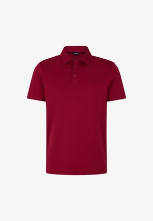 Rode poloshirt van katoen, met een klassieke kraag, drieknoopsluiting en een klein geborduurd logo op de borst.