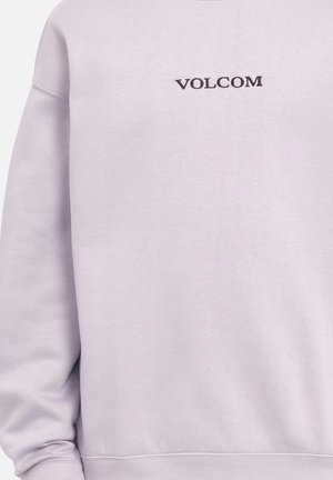 Light purple sweatshirt with ribbed cuffs and hem. Features a dark embroidered "VOLCOM" logo on the front. Soft, smooth texture.