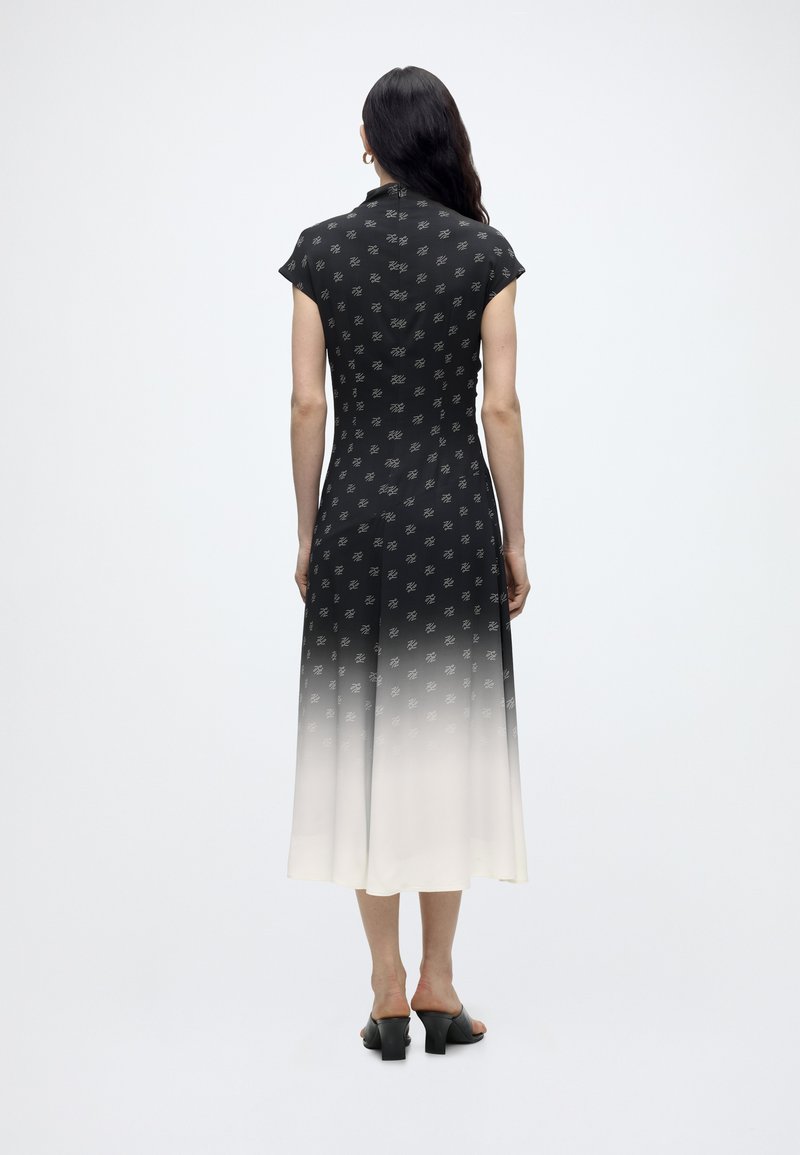 black and cream dresses Benedetta Black & Cream Long-Sleeve Drop-Waist Maxi Dress – Club L London main image 0