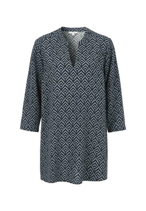 Langarm tuniek met een abstracte blauwe en zwarte bladmuster op een witte achtergrond en een V-hals.