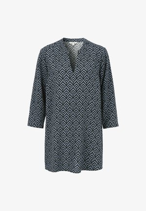 Langärmlige Tunika mit blauem und schwarzem abstraktem Blattmuster sowie einem V-Ausschnitt auf weißem Hintergrund.