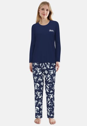 Navyblaues Langarmoberteil mit dem Text "dream"; kombiniert mit navyblauen Blumendruckhosen in Weiß. Weicher Stoff, lässige Passform und gerade Schnittführung.
