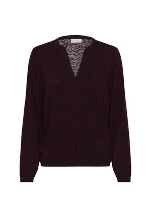 Haut bordeaux à manches longues avec un col en V, présentant un motif zèbre et une texture douce, conçu avec une coupe décontractée et une taille froncée.
