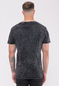 Paradiso Clothing THE WHO TARGET BAND LOGO SNOW WASH - Print T-shirt - black