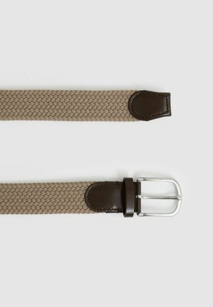 Kootud beež vöök, millel on tumeda pruuniga nahkdetailid ja hõbedane metallist pandla. Omab tekstuuri mustrit ja siledat viimistlust otstes.