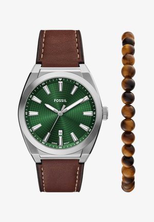 Fossil watch with green patterned dial, silver hands, and brown leather strap. Includes a companion bracelet of polished brown tiger's eye beads.