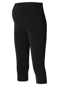 Svarta capri leggings gjorda av stretchigt, slätt tyg; har en bred, sömlös midjelinje och en figurnära design.