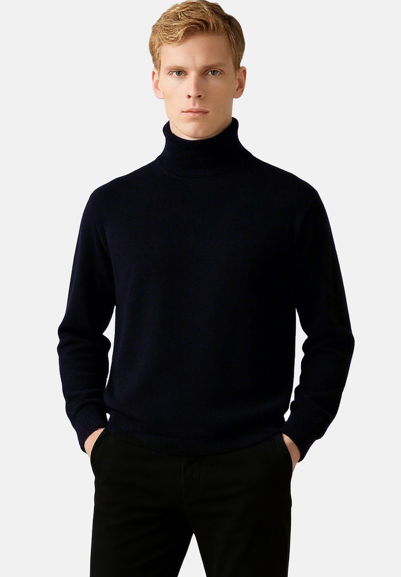 Námořnický rolák vyrobený z měkké tkaniny, s dlouhými rukávy, žebrovanými manžetami a těsným střihem kolem límce a pasu.