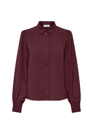 Blusa burgundy de manga larga con cierre de botones, de tela suave, cuello redondeado y puños de manga fruncidos. Superficie texturizada con un ligero brillo.