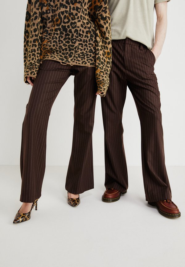 STACKED FLARE UNISEX - Trousers