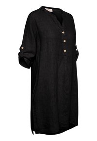 Tunique-robe noire en lin jusqu'aux genoux avec trois boutons beiges, manches retroussées maintenues par des pattes boutonnées, et un col rond avec une petite fente.