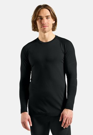 SEAMLESS PERFORMANCE - Unterhemd/-shirt - black