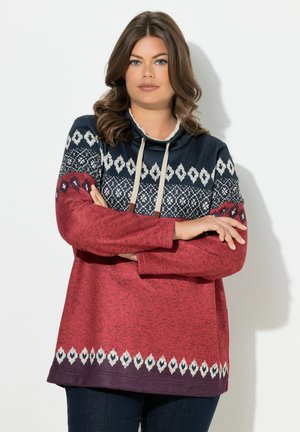 Sudadera oversized roja y azul marino con un patrón de diamantes y cordón, que cuenta con mangas largas y tonos variados en el dobladillo. Textura de mezcla de algodón.