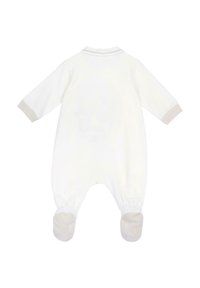 Weißer Jumpsuit mit langen Ärmeln, weicher Textur, hellbeige Akzenten an den Bündchen und Fußteilen, mit klassischem Kragen-Design.