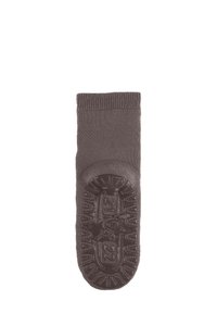 Brown knitted slipper sock with rubber sole grip featuring size number and textured pattern for indoor use.