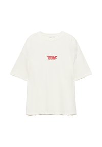 Maglietta bianca a maniche corte, vestibilità larga, con collo tondo e testo rosso "VUOI DIVENTARE LA MIA NUOVA COMPAGNA DI STANZA?" centrato sul petto.