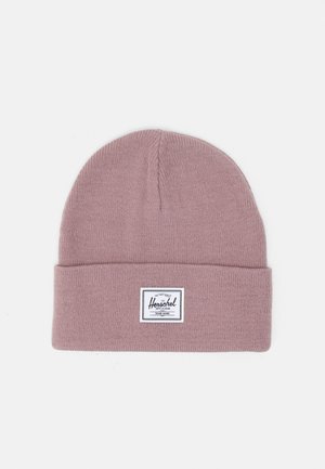 Berretto a maglia in morbido tessuto rosa chiaro con risvolto. Presenta un'etichetta rettangolare bianca con il logo del marchio "Herschel".