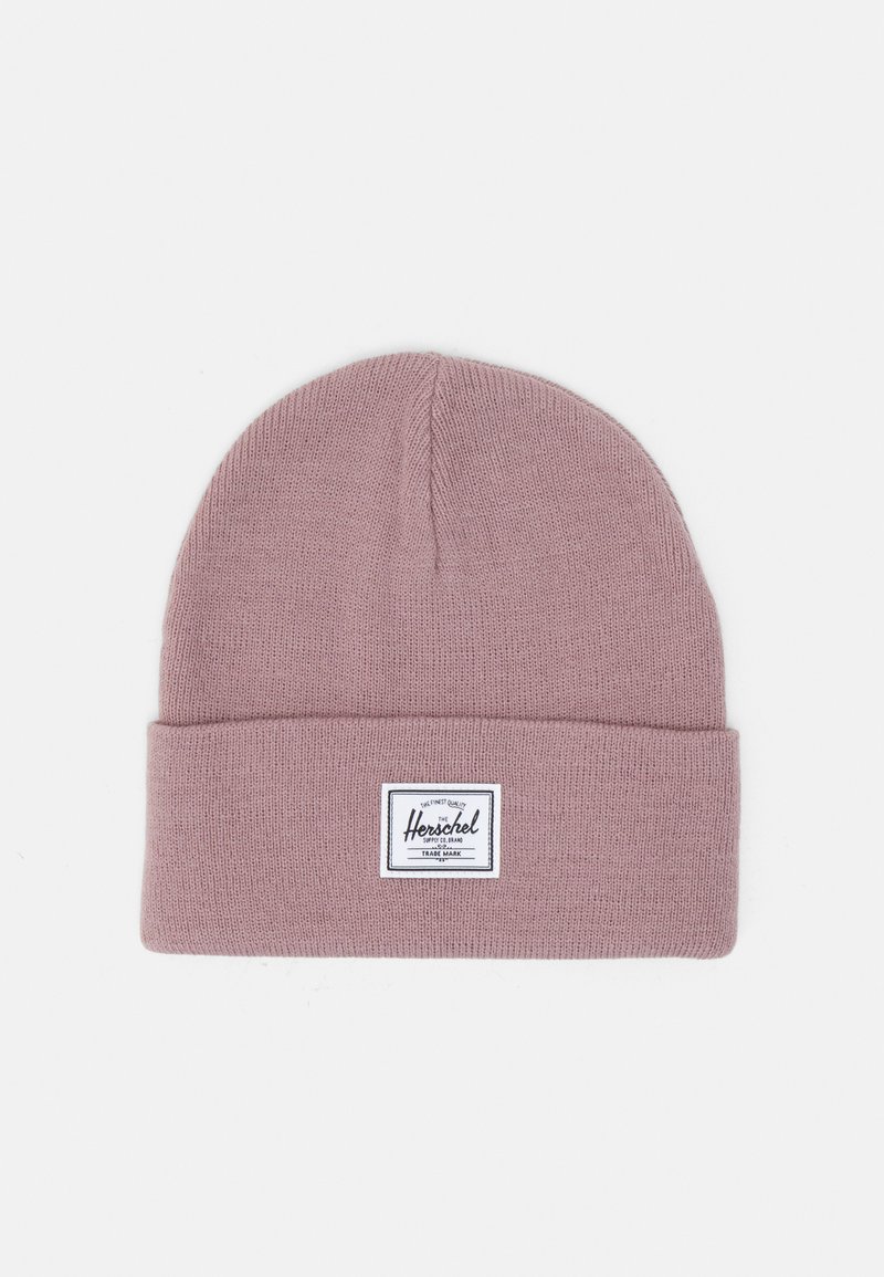 Berretto a maglia in morbido tessuto rosa chiaro con risvolto. Presenta un'etichetta rettangolare bianca con il logo del marchio "Herschel".