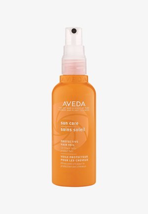 Aveda Sun Care Protective Hair Veil i en orange plastflaska med spray. Har en genomskinlig spraymunstycke och vit text med växtinspirerad design.