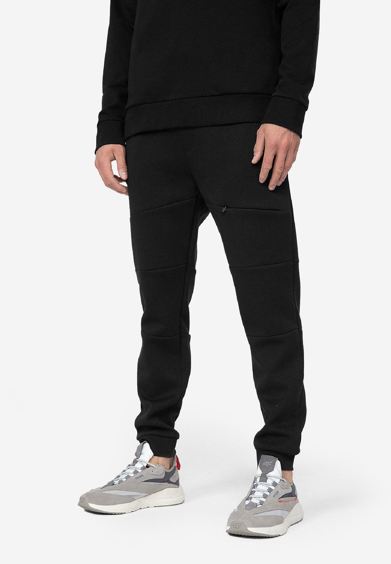 4F Tracksuit bottoms deep black/black Zalando.ie